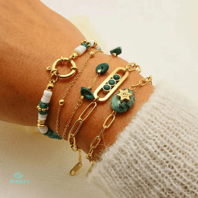 Serenity bracelet; Emerald green bracelet; Green quartz crystals; Healing energy bracelet; Calming bracelet; Natural quartz jewelry; Green gemstone bracelet; Crystal healing jewelry; Serenity and balance; Elegant green bracelet; Quartz crystal bracelet; Mindful jewelry; Spiritual healing; Green quartz benefits; Tranquil energy; Serenity and peace; 