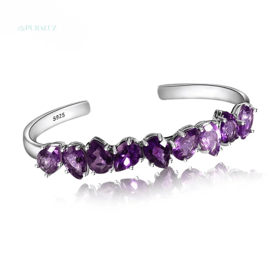 Sterling silver bracelet; Amethyst stone bracelet; Silver jewelry with amethyst; Elegant sterling silver bracelet; Handmade amethyst bracelet; Gemstone silver bracelet; Amethyst embedded bracelet; Unique sterling silver design; Stylish silver bracelet; Luxury amethyst jewelry; Birthstone bracelet; Healing stone bracelet; Adjustable silver bracelet; Fashionable amethyst piece;