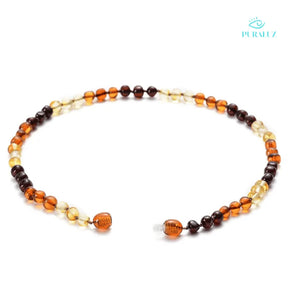 Natural Amber Necklace; Amber necklace for babies; Amber teething necklace; Amber necklace for adults; Soothing amber jewelry; Natural amber healing; Baltic amber necklace; Baby amber teething relief; Adult amber necklace; Amber stone benefits; Non-toxic amber necklace; Eco-friendly amber jewelry; Stylish amber accessory; Amber necklace for sensitive skin; Amber for wellness; Organic amber jewelry; Durable amber necklace;