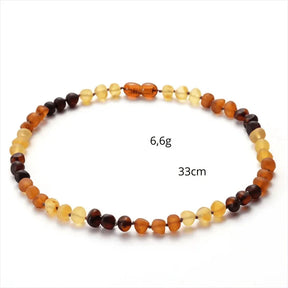 Natural Amber Necklace; Amber necklace for babies; Amber teething necklace; Amber necklace for adults; Soothing amber jewelry; Natural amber healing; Baltic amber necklace; Baby amber teething relief; Adult amber necklace; Amber stone benefits; Non-toxic amber necklace; Eco-friendly amber jewelry; Stylish amber accessory; Amber necklace for sensitive skin; Amber for wellness; Organic amber jewelry; Durable amber necklace;