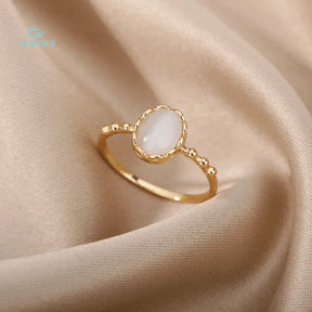 Pearl Ether ring; Elegant pearl ring; Natural pearl jewelry; Timeless pearl ring; Handcrafted pearl ring; Sophisticated pearl accessory; Classic pearl design; Elegant gemstone ring; Statement pearl ring; Luxurious pearl ring; Vintage-inspired pearl ring; Artisan pearl jewelry; Pearl and silver ring; Opulent pearl piece; Unique pearl engagement ring; 