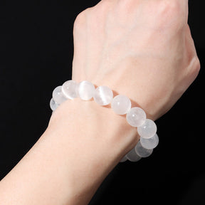 Selenite purification bracelet; Selenite stone bracelet; Handcrafted natural stone jewelry; Unique design for cleansing and healing; Artisan-crafted accessory; Ethically sourced selenite; Gift for spiritual enthusiasts; Stylish and elegant for everyday wear; Durable and fashionable; Beautifully polished selenite beads; Unique spiritual gift; Bracelet for energy clearing and purification; Natural stones for emotional balance; Lightweight and comfortable; Ideal for meditation practices;