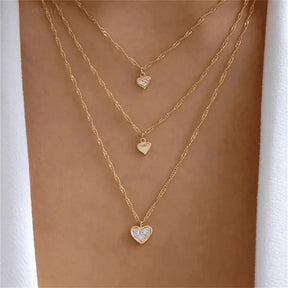 Divine necklace set; Pearl and crucifix jewelry; Elegant pearl necklaces; Stylish crucifix pendants; Handmade pearl jewelry; Christian faith necklaces; Unique pearl and crucifix design; Versatile necklace set; Fashionable religious jewelry; Statement pearl necklaces; Personalized crucifix necklaces; Luxurious pearl and gold jewelry; Spiritual symbolism necklaces; Layered pearl necklace set; Artisan-crafted crucifix jewelry; Gift for faith; Beautifully designed pearl necklaces; Modern crucifix jewelry; 