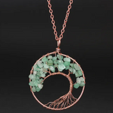 Tree of Life necklace; Natural crystals jewelry; Symbol of growth and strength; Handcrafted with care and precision; Beautifully designed for everyday wear; Promotes balance and harmony; Perfect for nature lovers; Enhances spiritual connection and healing; Ethically sourced natural stones; Lightweight and comfortable to wear; Unique and meaningful gift;
