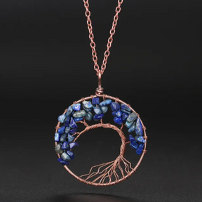 Tree of Life necklace; Natural crystals jewelry; Symbol of growth and strength; Handcrafted with care and precision; Beautifully designed for everyday wear; Promotes balance and harmony; Perfect for nature lovers; Enhances spiritual connection and healing; Ethically sourced natural stones; Lightweight and comfortable to wear; Unique and meaningful gift;