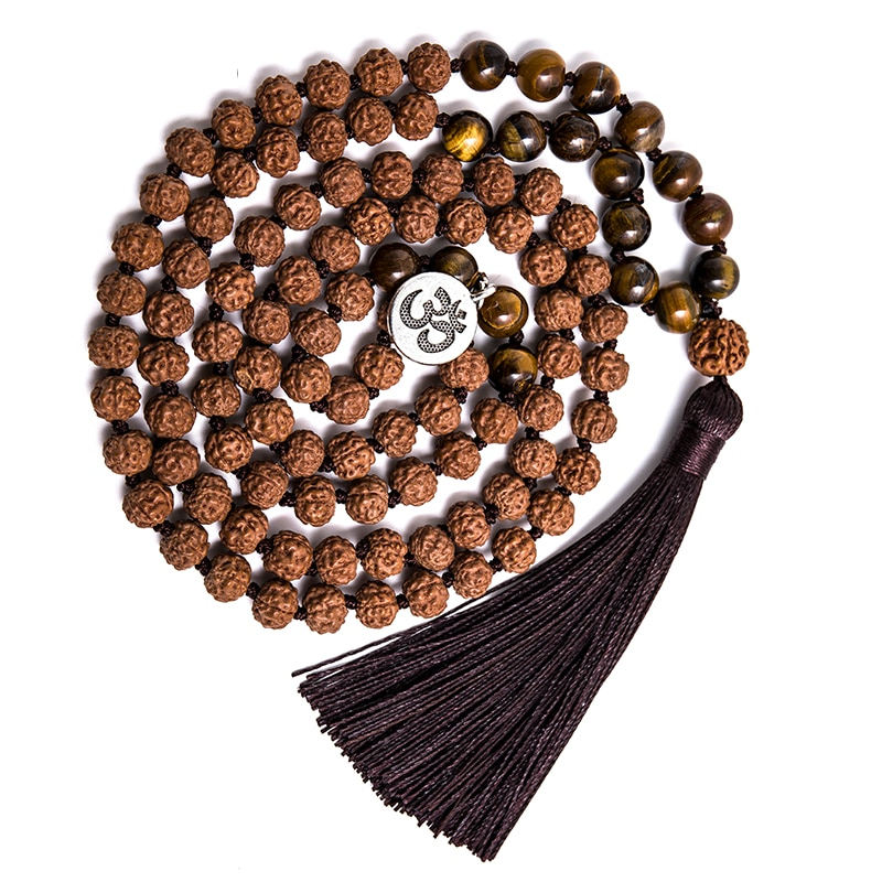 Rudraksha japamala; Tiger Eye beads mala; Handcrafted prayer beads; Unique meditation necklace; Spiritual jewelry; Gift with free bracelet; Artisan-crafted japamala; Natural stone beads; Japamala for mindfulness; Ethically sourced materials; Japamala for mantra repetition; Beautiful beaded necklace; Unique spiritual gift; Calming meditation accessory; Rudraksha for spiritual growth; Tiger Eye for protection; Japamala for intention setting; Stylish spiritual accessory;