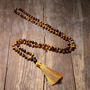 108 bead japamala; Tiger's Eye mala necklace; Handcrafted prayer beads; Spiritual jewelry; Artisan-crafted japamala; Natural Tiger's Eye beads; Japamala for mindfulness; Gift for meditation enthusiasts; Japamala for focus and protection; Healing energy necklace; Tiger's Eye for confidence and strength; Beautiful beaded necklace; Unique spiritual gift; Japamala for mantra repetition; Calming meditation accessory; Japamala for intention setting; Stylish spiritual accessory;