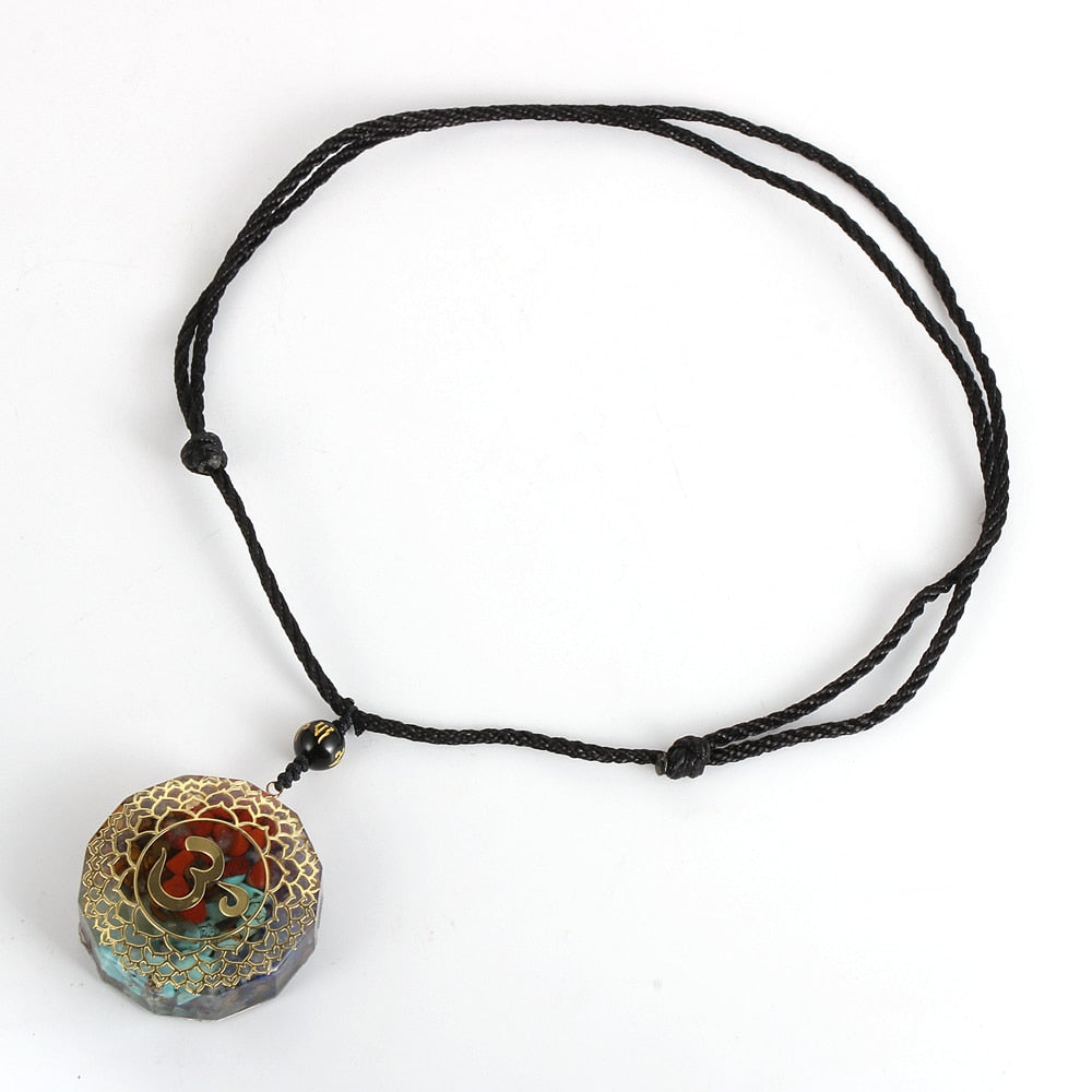 Orgonite OM necklace; Handcrafted spiritual jewelry; Unique design for energy protection and balance; Artisan-crafted accessory; Ethically sourced materials; Gift for meditation and mindfulness enthusiasts; Stylish and meaningful for everyday wear; Durable and fashionable; Beautifully detailed OM symbol for spiritual connection; Unique spiritual gift; Necklace for enhancing personal energy and harmony; Natural elements for emotional healing and grounding;