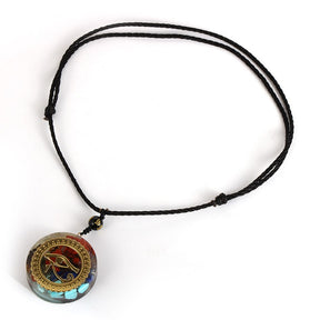 Horus Eye orgonite necklace; Handcrafted spiritual jewelry; Unique design symbolizing protection and insight; Artisan-crafted accessory; Ethically sourced materials; Gift for spiritual seekers and enthusiasts; Stylish and meaningful for everyday wear; Durable and fashionable; Beautifully detailed Eye of Horus symbol; Necklace for enhancing positive energy and protection; Natural elements for emotional balance and healing; Lightweight and comfortable;