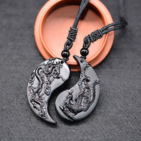 Couple set Phoenix and Dragon necklaces; Black obsidian couple jewelry; Handcrafted symbolic necklaces; Yin and Yang balance; Phoenix and Dragon design for harmony and strength; Perfect gift for couples; Matching necklaces for love and unity; Stylish and meaningful accessory; Black obsidian for protection and grounding; Durable and fashionable; Ethically sourced materials; Spiritual symbolism for love and power; 