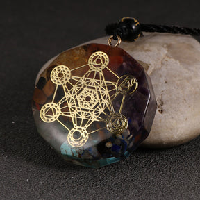 Metatron orgonite necklace; Handcrafted spiritual jewelry; Unique design symbolizing divine energy and harmony; Artisan-crafted accessory; Ethically sourced materials; Gift for spiritual seekers and enthusiasts; Stylish and meaningful for everyday wear; Durable and fashionable; Beautifully detailed Metatron's Cube symbol; Necklace for enhancing positive energy and balance; Natural elements for emotional healing; Lightweight and comfortable;