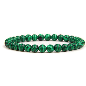 Malachite bracelet; Extraordinary healing energy bracelet; Handcrafted gemstone jewelry; Unique design for transformation and growth; Artisan-crafted accessory; Ethically sourced malachite; Gift for wellness seekers; Stylish and vibrant for everyday wear; Durable and fashionable; Beautifully polished malachite beads; Unique spiritual gift; Bracelet for emotional healing and balance; Natural stones for personal empowerment; Lightweight and comfortable; Ideal for meditation practices;