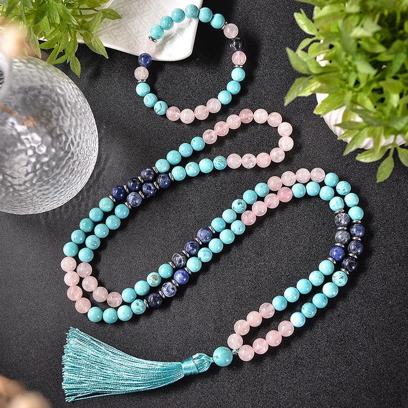 Spiritual Ascension japamala; Handcrafted prayer beads; Rose Quartz for love and healing; Sodalite for intuition and harmony; Turquoise for protection and communication; Unique meditation necklace; Artisan-crafted japamala; Natural gemstone beads; Japamala for mindfulness; Gift for meditation enthusiasts; Ethically sourced materials; Japamala for mantra repetition; Beautiful beaded necklace; Unique spiritual gift; Calming meditation accessory; Japamala for intention setting;