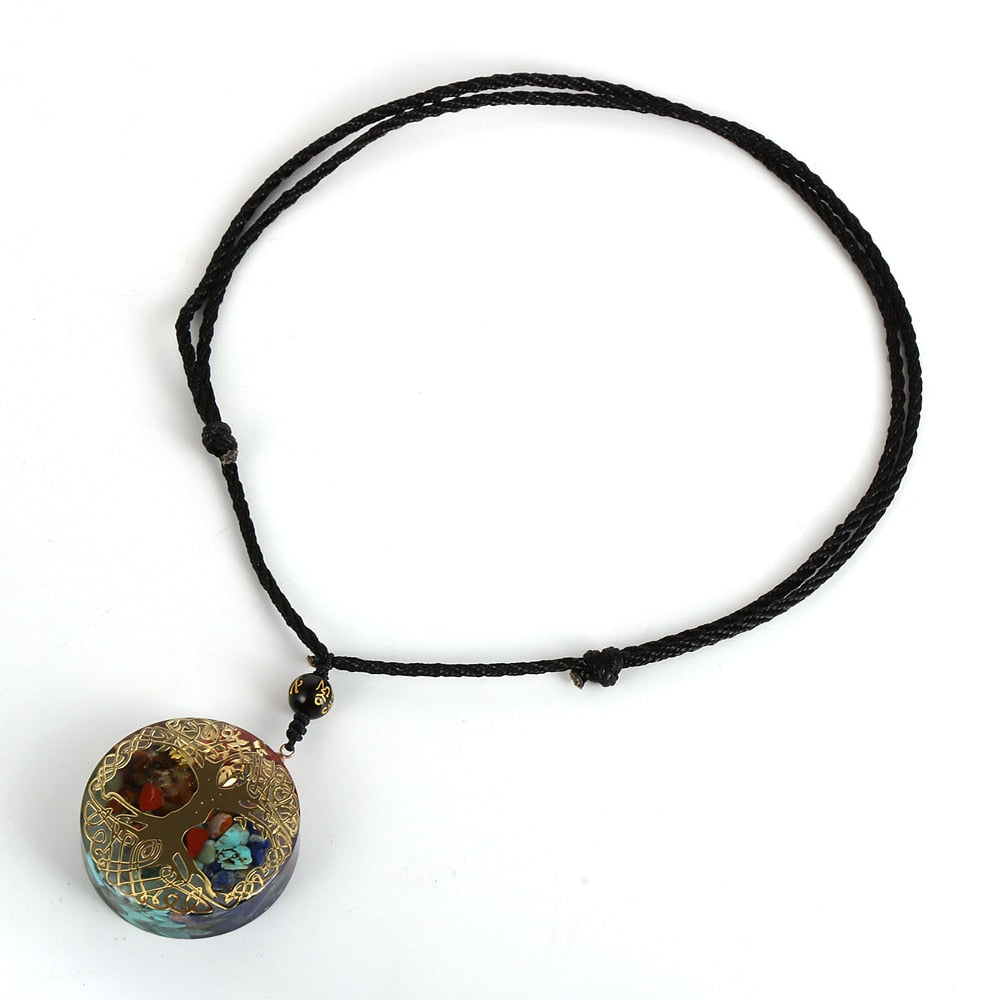 Tree of Life orgonite necklace; Handcrafted spiritual jewelry; Unique design symbolizing growth and connection; Artisan-crafted accessory; Ethically sourced materials; Gift for nature lovers and spiritual seekers; Stylish and meaningful for everyday wear; Durable and fashionable; Beautifully detailed Tree of Life symbol; Necklace for enhancing positive energy and protection; Natural elements for emotional healing and balance; Lightweight and comfortable;