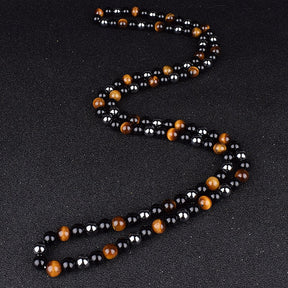 Triple protection necklace; Symbol of protection, power, and balance; Handcrafted artisan jewelry; Unique design for spiritual strength; Ethically sourced materials for conscious living; Perfect gift for those seeking inner strength; Enhances personal energy and resilience; Durable and stylish for everyday wear; Lightweight and comfortable for all-day use; Ideal for layering with other necklaces; Represents harmony and well-being; Thoughtful gift for special occasions; 