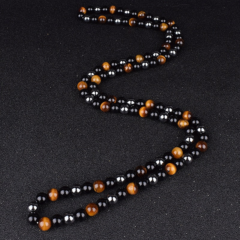 Triple protection necklace; Symbol of protection, power, and balance; Handcrafted artisan jewelry; Unique design for spiritual strength; Ethically sourced materials for conscious living; Perfect gift for those seeking inner strength; Enhances personal energy and resilience; Durable and stylish for everyday wear; Lightweight and comfortable for all-day use; Ideal for layering with other necklaces; Represents harmony and well-being; Thoughtful gift for special occasions; 