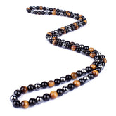 Triple protection necklace; Symbol of protection, power, and balance; Handcrafted artisan jewelry; Unique design for spiritual strength; Ethically sourced materials for conscious living; Perfect gift for those seeking inner strength; Enhances personal energy and resilience; Durable and stylish for everyday wear; Lightweight and comfortable for all-day use; Ideal for layering with other necklaces; Represents harmony and well-being; Thoughtful gift for special occasions;