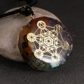 Metatron orgonite necklace; Handcrafted spiritual jewelry; Unique design symbolizing divine energy and harmony; Artisan-crafted accessory; Ethically sourced materials; Gift for spiritual seekers and enthusiasts; Stylish and meaningful for everyday wear; Durable and fashionable; Beautifully detailed Metatron's Cube symbol; Necklace for enhancing positive energy and balance; Natural elements for emotional healing; Lightweight and comfortable;