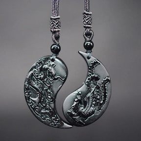 Couple set Phoenix and Dragon necklaces; Black obsidian couple jewelry; Handcrafted symbolic necklaces; Yin and Yang balance; Phoenix and Dragon design for harmony and strength; Perfect gift for couples; Matching necklaces for love and unity; Stylish and meaningful accessory; Black obsidian for protection and grounding; Durable and fashionable; Ethically sourced materials; Spiritual symbolism for love and power; 