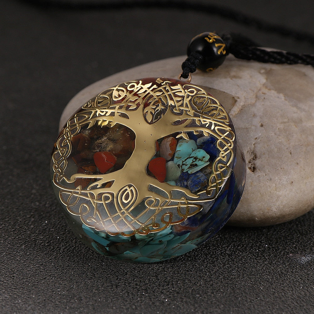 Tree of Life orgonite necklace; Handcrafted spiritual jewelry; Unique design symbolizing growth and connection; Artisan-crafted accessory; Ethically sourced materials; Gift for nature lovers and spiritual seekers; Stylish and meaningful for everyday wear; Durable and fashionable; Beautifully detailed Tree of Life symbol; Necklace for enhancing positive energy and protection; Natural elements for emotional healing and balance; Lightweight and comfortable;