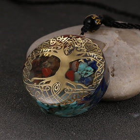 Tree of Life orgonite necklace; Handcrafted spiritual jewelry; Unique design symbolizing growth and connection; Artisan-crafted accessory; Ethically sourced materials; Gift for nature lovers and spiritual seekers; Stylish and meaningful for everyday wear; Durable and fashionable; Beautifully detailed Tree of Life symbol; Necklace for enhancing positive energy and protection; Natural elements for emotional healing and balance; Lightweight and comfortable;
