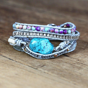 Celestial protection bracelet; Turquoise stone bracelet; Handcrafted gemstone jewelry; Unique design for spiritual protection; Artisan-crafted accessory; Ethically sourced turquoise; Gift for those seeking tranquility; Stylish and vibrant for everyday wear; Durable and fashionable; Beautifully polished turquoise beads; Unique spiritual gift; Bracelet for healing and emotional balance; Natural stones for inner peace; Lightweight and comfortable;