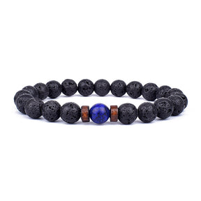Tibetan bracelet; Volcanic lava stone bracelet; Handcrafted spiritual jewelry; Unique design for grounding and strength; Artisan-crafted accessory; Ethically sourced volcanic lava; Gift for those seeking stability; Stylish and rugged for everyday wear; Durable and fashionable; Beautifully textured lava beads; Unique spiritual gift; Bracelet for protection and emotional balance; Natural stones for personal empowerment; Lightweight and comfortable; Ideal for meditation practices;