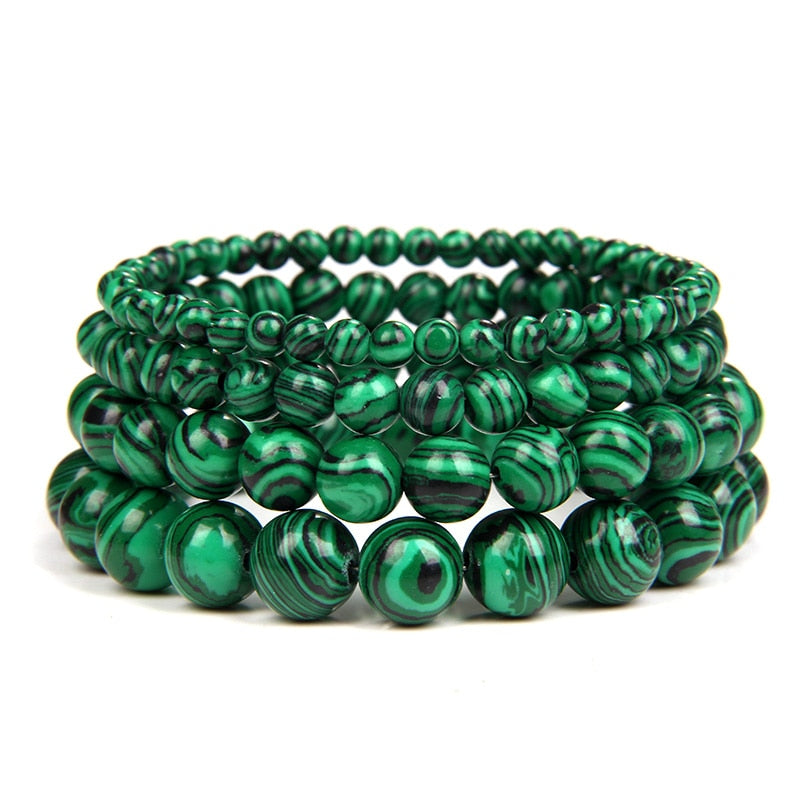 Malachite bracelet; Extraordinary healing energy bracelet; Handcrafted gemstone jewelry; Unique design for transformation and growth; Artisan-crafted accessory; Ethically sourced malachite; Gift for wellness seekers; Stylish and vibrant for everyday wear; Durable and fashionable; Beautifully polished malachite beads; Unique spiritual gift; Bracelet for emotional healing and balance; Natural stones for personal empowerment; Lightweight and comfortable; Ideal for meditation practices;