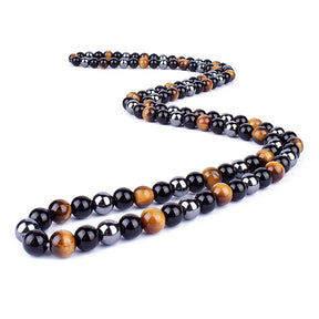 Triple protection necklace; Symbol of protection, power, and balance; Handcrafted artisan jewelry; Unique design for spiritual strength; Ethically sourced materials for conscious living; Perfect gift for those seeking inner strength; Enhances personal energy and resilience; Durable and stylish for everyday wear; Lightweight and comfortable for all-day use; Ideal for layering with other necklaces; Represents harmony and well-being; Thoughtful gift for special occasions;