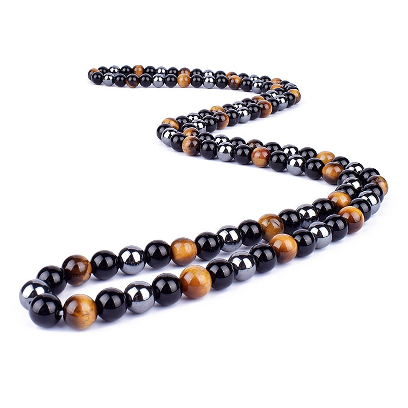 Triple protection necklace; Symbol of protection, power, and balance; Handcrafted artisan jewelry; Unique design for spiritual strength; Ethically sourced materials for conscious living; Perfect gift for those seeking inner strength; Enhances personal energy and resilience; Durable and stylish for everyday wear; Lightweight and comfortable for all-day use; Ideal for layering with other necklaces; Represents harmony and well-being; Thoughtful gift for special occasions;
