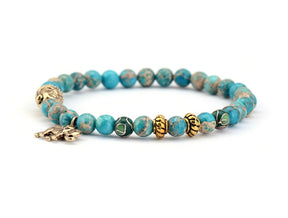 Buddhist bracelet; Natural stones bracelet; Handcrafted spiritual jewelry; Unique meditation accessory; Artisan-crafted bracelet; Ethically sourced natural stones; Bracelet for mindfulness; Gift for meditation practitioners; Healing energy bracelet; Calming meditation accessory; Bracelet for intention setting; Beautiful beaded bracelet; Unique spiritual gift; Bracelet for balance and harmony; Natural stones for grounding; Stylish and meaningful jewelry;