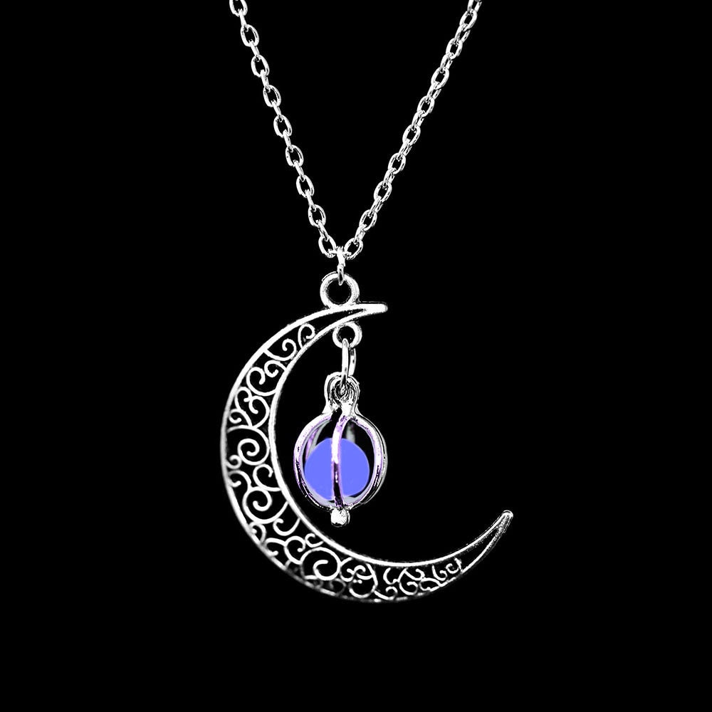 Luminous moon pendant necklace; Glows in the dark jewelry; Moon-inspired glowing necklace; Unique celestial necklace design; Captures the magic of the night sky; Perfect gift for moon lovers; Ethereal glow in the dark pendant; Handcrafted luminous jewelry; Stylish accessory for day or night; Symbol of mystery and elegance; Adds a touch of celestial beauty;