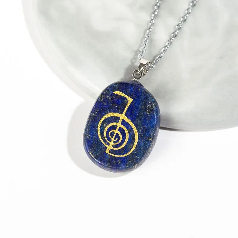 Reiki symbols necklace; Lapis lazuli pendant; Natural stone jewelry; Reiki healing necklace; Lapis lazuli energy stone; Spiritual protection necklace; Chakra balancing jewelry; Reiki amulet necklace; Handmade lapis lazuli necklace; Healing crystal pendant; Energy flow necklace; Lapis lazuli charm; Reiki power necklace; Meditation necklace with symbols; 