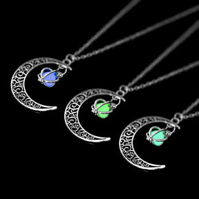 Luminous moon pendant necklace; Glows in the dark jewelry; Moon-inspired glowing necklace; Unique celestial necklace design; Captures the magic of the night sky; Perfect gift for moon lovers; Ethereal glow in the dark pendant; Handcrafted luminous jewelry; Stylish accessory for day or night; Symbol of mystery and elegance; Adds a touch of celestial beauty;