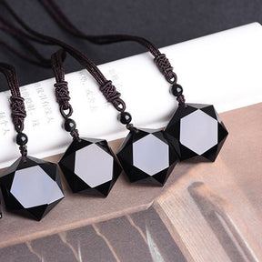 Hexagonal necklace; Black obsidian pendant; Natural stone necklace; Obsidian healing jewelry; Hexagon black obsidian necklace; Protection necklace black obsidian; Stylish hexagonal gemstone; Elegant obsidian necklace; Black obsidian energy stone; Crystal hexagon pendant; Spiritual protection jewelry; Obsidian crystal necklace; Hexagonal gemstone pendant; Black stone necklace; Obsidian charm necklace; Healing stone jewelry;