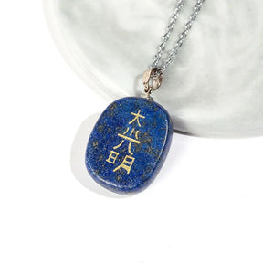 Reiki symbols necklace; Lapis lazuli pendant; Natural stone jewelry; Reiki healing necklace; Lapis lazuli energy stone; Spiritual protection necklace; Chakra balancing jewelry; Reiki amulet necklace; Handmade lapis lazuli necklace; Healing crystal pendant; Energy flow necklace; Lapis lazuli charm; Reiki power necklace; Meditation necklace with symbols; 