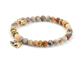 Buddhist bracelet; Natural stones bracelet; Handcrafted spiritual jewelry; Unique meditation accessory; Artisan-crafted bracelet; Ethically sourced natural stones; Bracelet for mindfulness; Gift for meditation practitioners; Healing energy bracelet; Calming meditation accessory; Bracelet for intention setting; Beautiful beaded bracelet; Unique spiritual gift; Bracelet for balance and harmony; Natural stones for grounding; Stylish and meaningful jewelry;