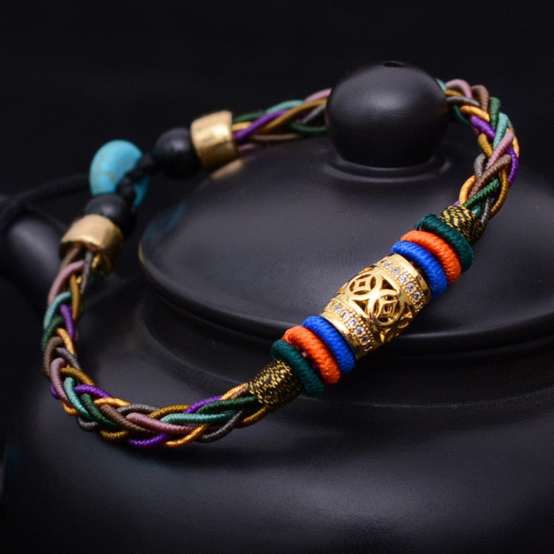 Tibetan 8-strand bracelet; Luck, health, and prosperity bracelet; Handcrafted Tibetan jewelry; Unique design for attracting good fortune; Artisan-crafted accessory; Ethically sourced materials; Gift for those seeking well-being and abundance; Stylish and meaningful for everyday wear; Durable and fashionable; Beautifully braided 8-strand design; Unique spiritual gift; Bracelet for enhancing vitality and balance; Natural elements for emotional and physical health; Lightweight and comfortable;