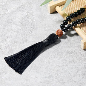 Rudraksha and Onyx japamala; Protection mala necklace; 108 beads prayer necklace; Handcrafted spiritual jewelry; Natural Rudraksha seeds; Onyx stone for protection; Artisan-crafted japamala; Japamala for mindfulness; Free bracelet included; Gift for meditation enthusiasts; Japamala for spiritual growth; Japamala for protection and grounding; Beautiful beaded necklace; Unique spiritual gift; Japamala for intention setting; Calming meditation accessory;