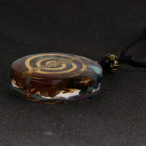 Reiki healing pendant; Cho Ku Rei energy transmuter; Orgonite 7 Chakras amulet; Spiritual energy protection; Chakra balancing necklace; Energy transmuting pendant; Reiki power symbol jewelry; Holistic healing amulet; Orgonite chakra harmonizer; Positive energy generator; Spiritual wellness accessory; Protective orgone energy pendant; Chakra alignment pendant;