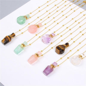 Natural crystal diffuser necklace; Handcrafted aromatherapy jewelry; Unique design for essential oil diffusion; Artisan-crafted accessory; Ethically sourced crystals; Stylish and functional for everyday wear; Durable and fashionable; Beautifully detailed crystal pendant; Necklace for enhancing positive energy and well-being; Natural stones for emotional balance; Ideal for aromatherapy on-the-go; Lightweight and comfortable; Perfect gift for wellness enthusiasts;