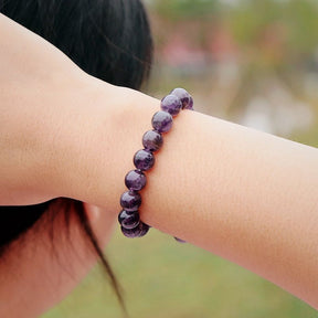 Harmony bracelet; Amethyst stone bracelet; Handcrafted gemstone jewelry; Unique design for balance; Artisan-crafted accessory; Ethically sourced amethyst; Gift for spiritual enthusiasts; Stylish and elegant for everyday wear; Durable and fashionable; Beautifully arranged amethyst beads; Unique spiritual gift; Bracelet for mindfulness and tranquility; Natural stones for emotional stability; Lightweight and comfortable; Ideal for layering with other bracelets;