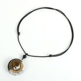 Yin Yang orgonite necklace; Handcrafted spiritual jewelry; Unique design for balancing energies; Artisan-crafted accessory; Ethically sourced materials; Gift for those seeking harmony and balance; Stylish and meaningful for everyday wear; Durable and fashionable; Beautifully detailed Yin Yang symbol for duality and unity; Unique spiritual gift; Necklace for enhancing energy flow and protection; Natural elements for emotional healing and grounding;