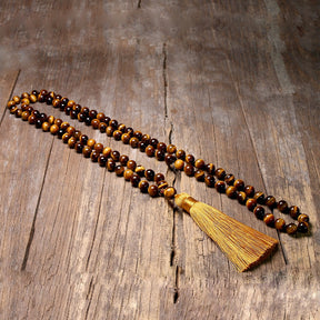 108 bead japamala; Tiger's Eye mala necklace; Handcrafted prayer beads; Spiritual jewelry; Artisan-crafted japamala; Natural Tiger's Eye beads; Japamala for mindfulness; Gift for meditation enthusiasts; Japamala for focus and protection; Healing energy necklace; Tiger's Eye for confidence and strength; Beautiful beaded necklace; Unique spiritual gift; Japamala for mantra repetition; Calming meditation accessory; Japamala for intention setting; Stylish spiritual accessory;