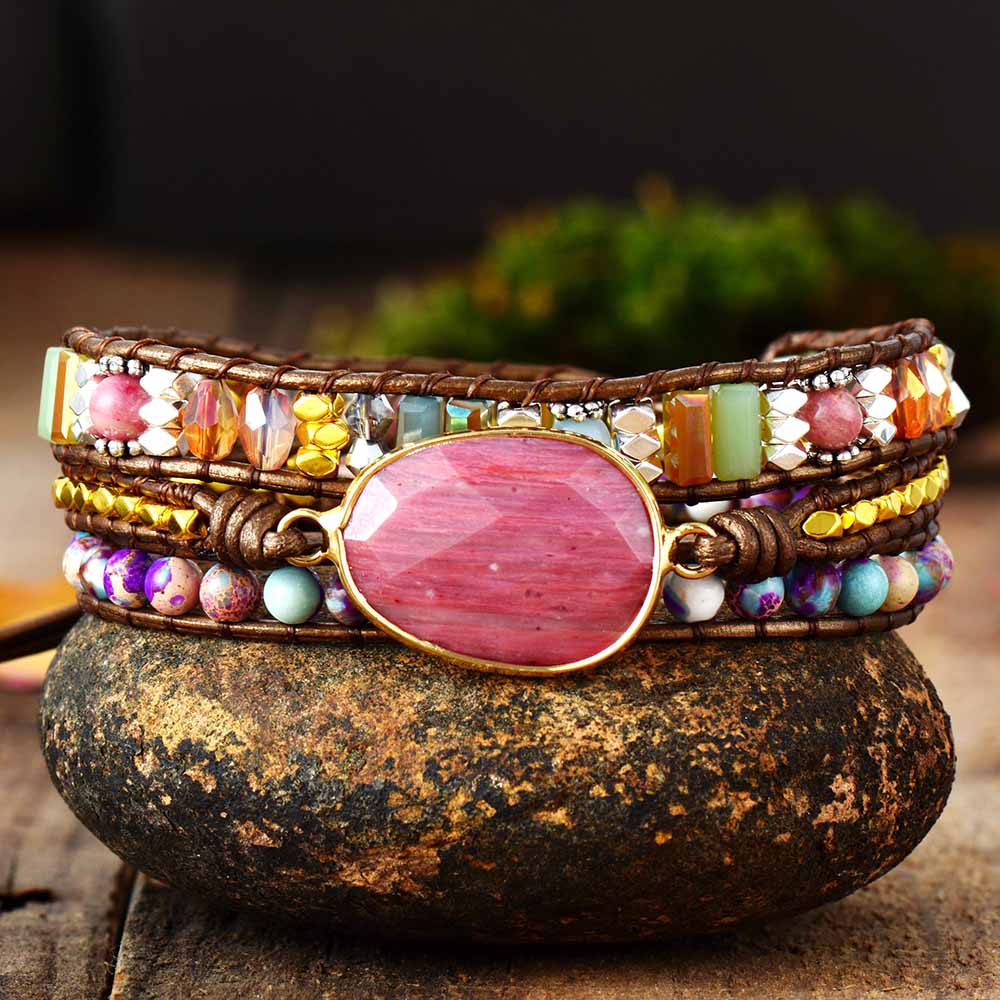 Natural healing bracelet; Rhodonite stone jewelry; Rhodonite healing bracelet; Genuine rhodonite gemstone; Spiritual jewelry for emotional balance; Rhodonite bracelet for love; Natural gemstone bracelet; Handcrafted rhodonite jewelry; Rhodonite crystal bracelet; Rhodonite bracelet for self-confidence; Authentic rhodonite bracelet; Unique healing jewelry; Gift for healing enthusiasts; Rhodonite for emotional healing; Artisan rhodonite bracelet; Natural rhodonite for balance; Rhodonite bracelet for protection