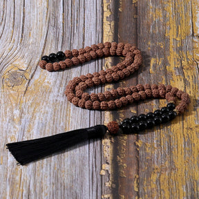 Rudraksha and Onyx japamala; Protection mala necklace; 108 beads prayer necklace; Handcrafted spiritual jewelry; Natural Rudraksha seeds; Onyx stone for protection; Artisan-crafted japamala; Japamala for mindfulness; Free bracelet included; Gift for meditation enthusiasts; Japamala for spiritual growth; Japamala for protection and grounding; Beautiful beaded necklace; Unique spiritual gift; Japamala for intention setting; Calming meditation accessory;