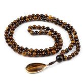 108 bead japamala; Tiger's Eye medal necklace; Handcrafted prayer beads; Spiritual jewelry; Artisan-crafted japamala; Natural Tiger's Eye beads; Japamala for mindfulness; Gift for meditation practitioners; Japamala for focus and protection; Healing energy necklace; Tiger's Eye for confidence and strength; Unique meditation necklace; Japamala for mantra repetition; Calming meditation accessory; Beautiful beaded necklace; Unique spiritual gift;