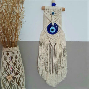 Greek eye amulet; Macramé protection amulet; Evil eye home decor; Protection for home and spaces; Handcrafted Greek eye amulet; Spiritual macramé wall hanging; Greek eye for warding off negativity; Unique protection decor; Evil eye macramé art; Home protection amulet; Greek eye for energy shielding; Boho-style Greek eye amulet; Holistic protection decoration; Amulet for peace and protection; Gift for home blessings; Evil eye symbol for protection;