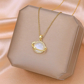 Shining Planet necklace; Luxurious white quartz jewelry; Elegant quartz necklace; White quartz gemstone necklace; Dazzling white quartz pendant; Statement jewelry piece; Artisan-crafted necklace; Nature-inspired luxury; Crystal quartz necklace; Unique gemstone pendant; Shining quartz design; White quartz for elegance; 
