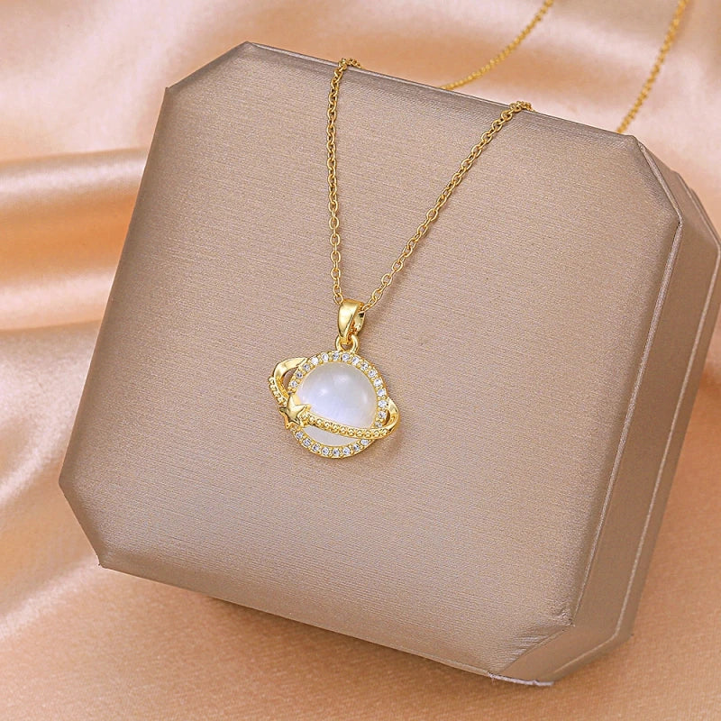 Shining Planet necklace; Luxurious white quartz jewelry; Elegant quartz necklace; White quartz gemstone necklace; Dazzling white quartz pendant; Statement jewelry piece; Artisan-crafted necklace; Nature-inspired luxury; Crystal quartz necklace; Unique gemstone pendant; Shining quartz design; White quartz for elegance; 